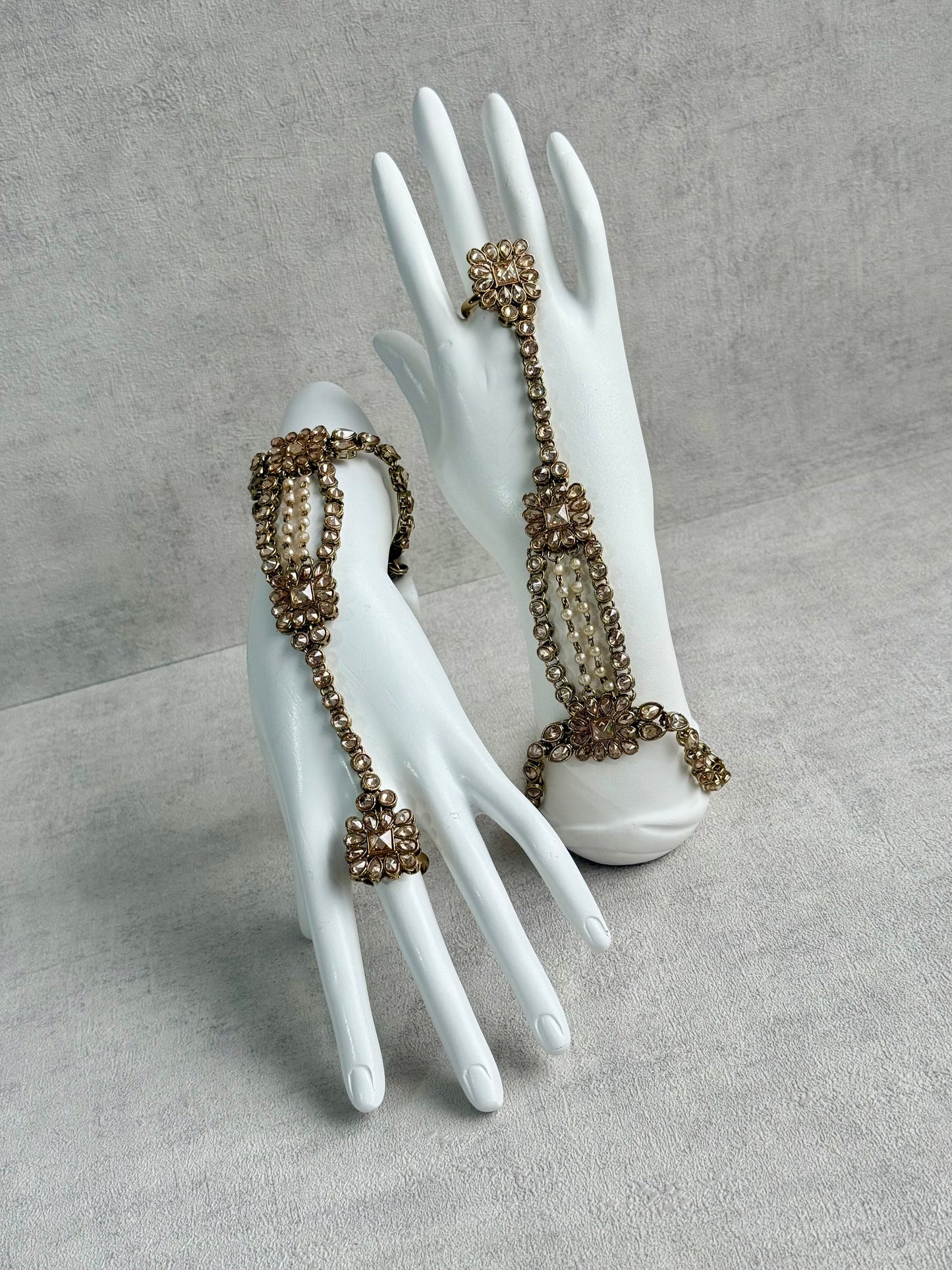 Ayura Designs Rupi Haathphool – Antique Gold with Champagne Stones & Pearl Detailing