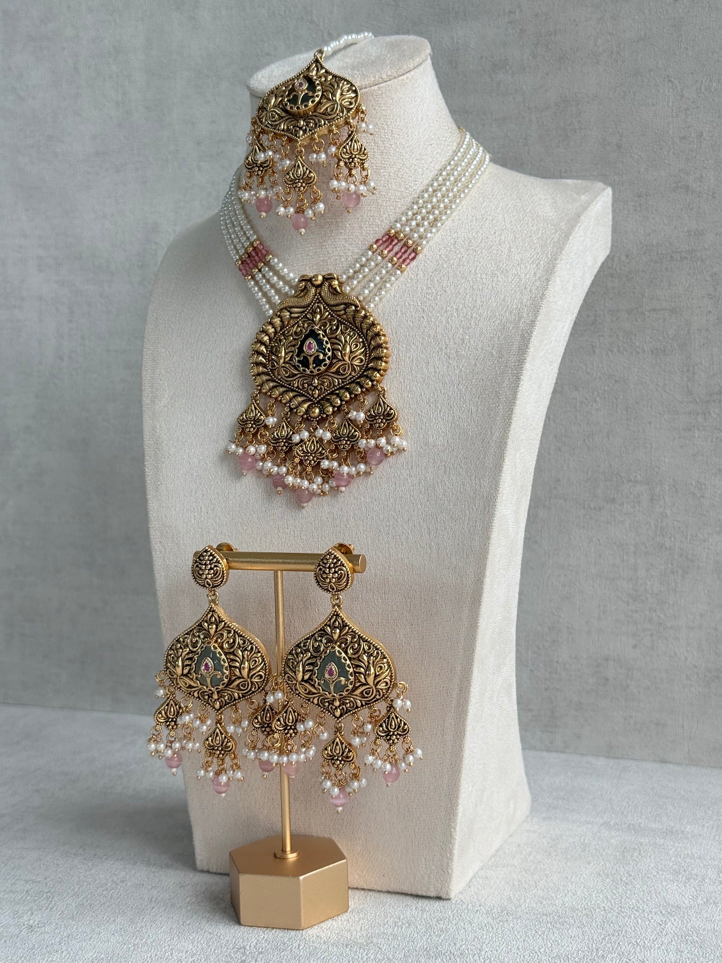 Ayura Designs Afia Necklace Set with Earrings & Tikka – Antique Gold, Blush Pink Pearls, Green Centre Stone & Peacock Motifs