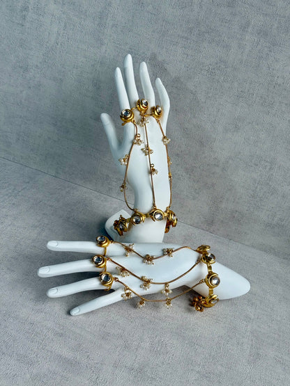 Ayura Designs Chand Haathphool – Antique Gold Hand Harness with Kundan-Style Mirror-Cut Stones & Pearl Detailing