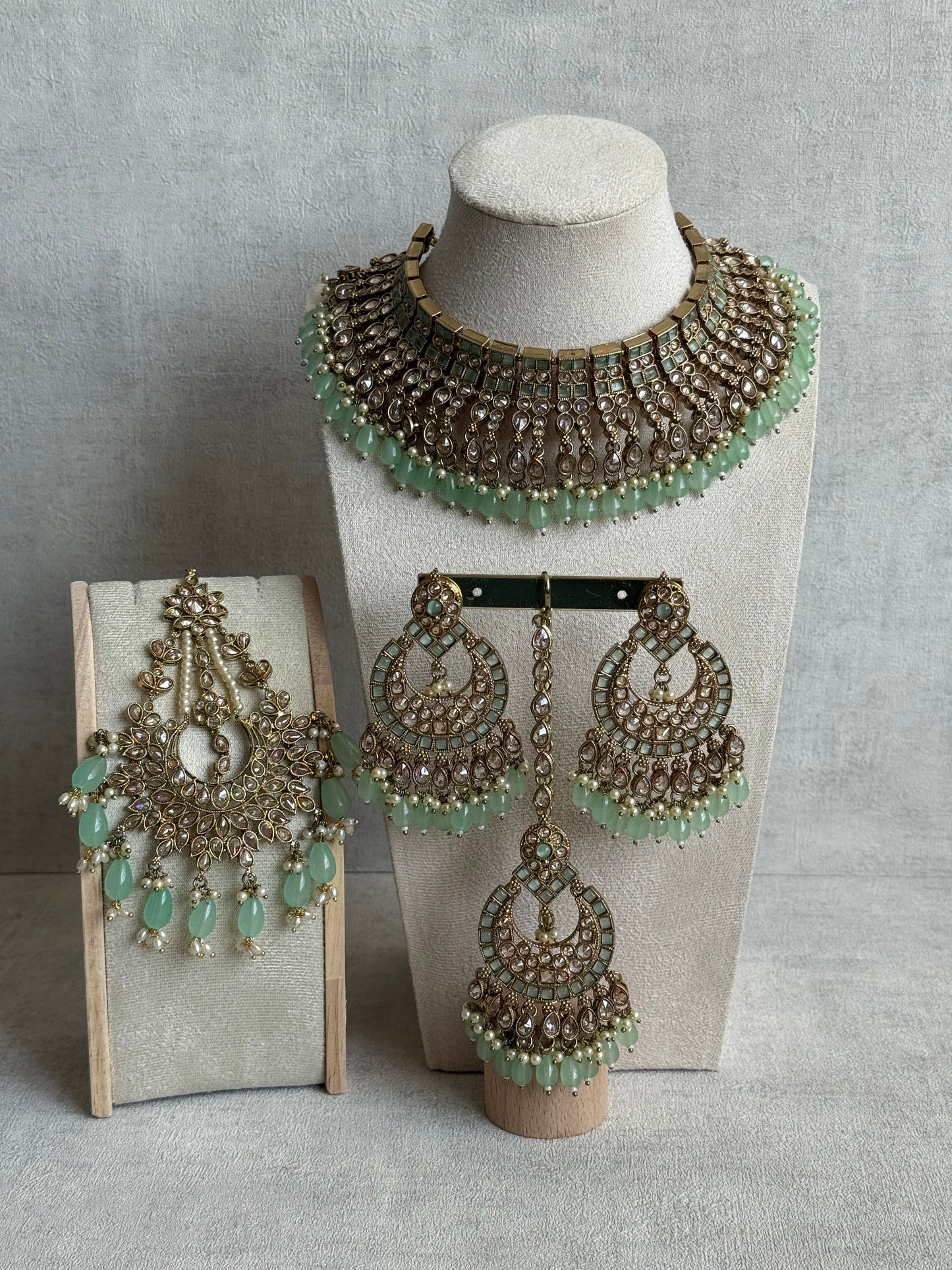 Ayura Designs Sajda Bridal Set with Necklace, Earrings, Tikka & Passa – Pistachio Green Beads, Kundan & Mirror-Cut Detailing