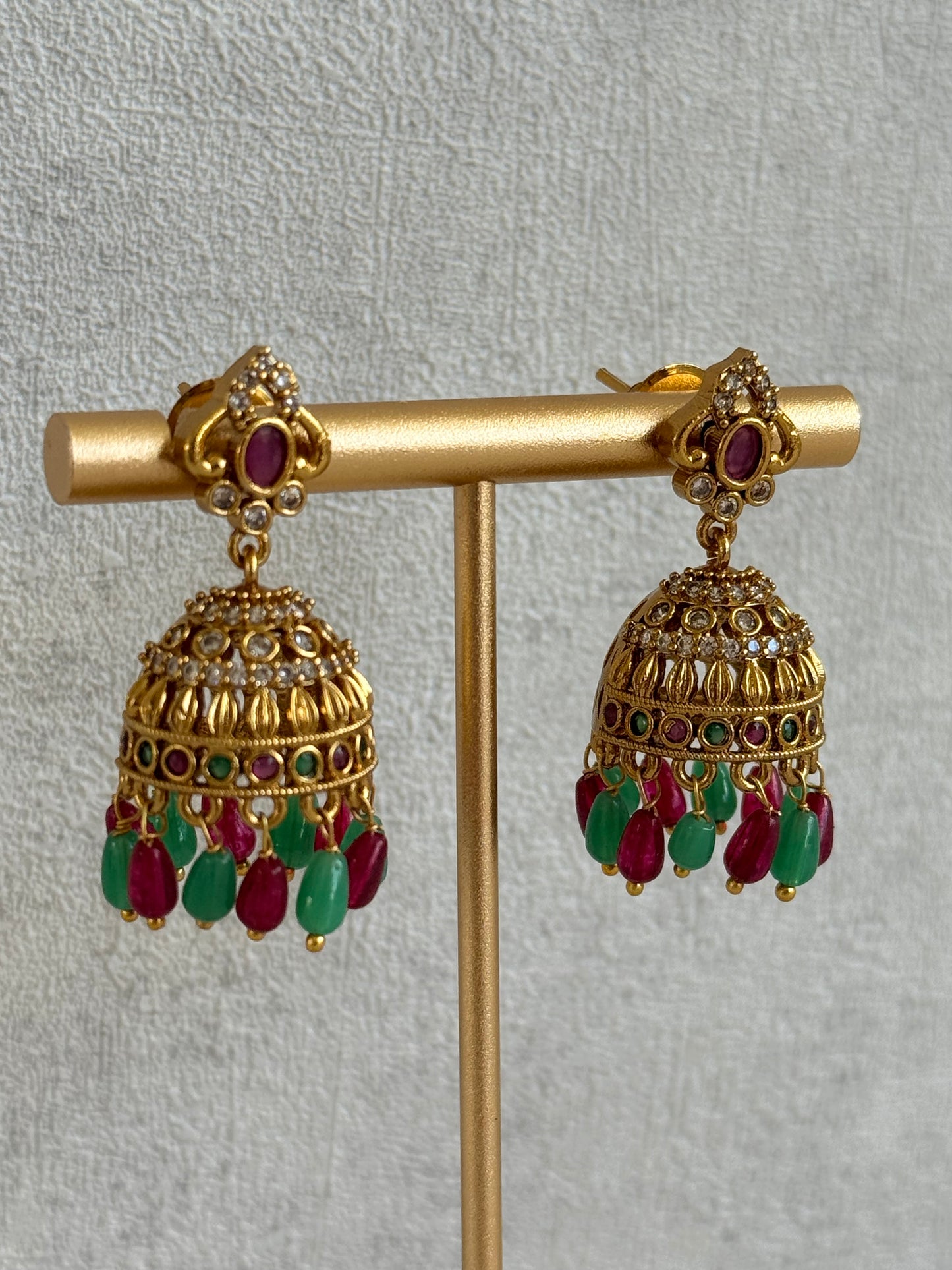 Ayura Designs Devi Jhumkis – Ruby Pink & Green Stones with Clear Stone Detailing & Gold Finish