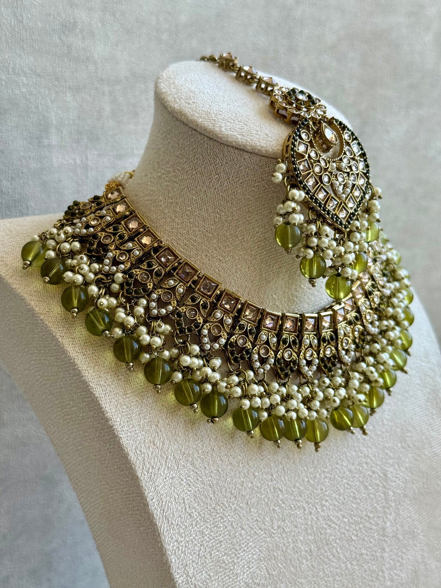 Ayura Designs Sabeen Set with Choker, Jhumkis, Tikka & Jhoomar – Champagne Kundan, Pearl Clusters & Olive Green Beads