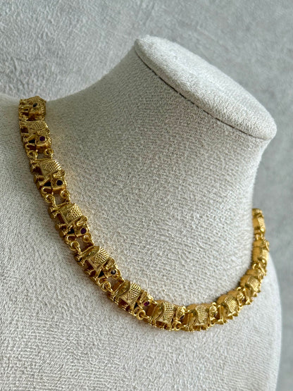 Ayura Designs Veda Set – Antique Gold Necklace & Stud Earrings with Elephant Motifs and Pink Stone Detailing