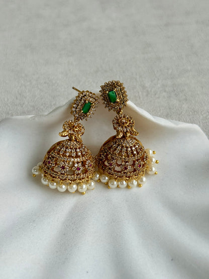 Ayura Designs Maya Jhumkis – Gold Jhumkis with Emerald Green Studs, Pink Stones, Crystal Detailing & Pearl Drops