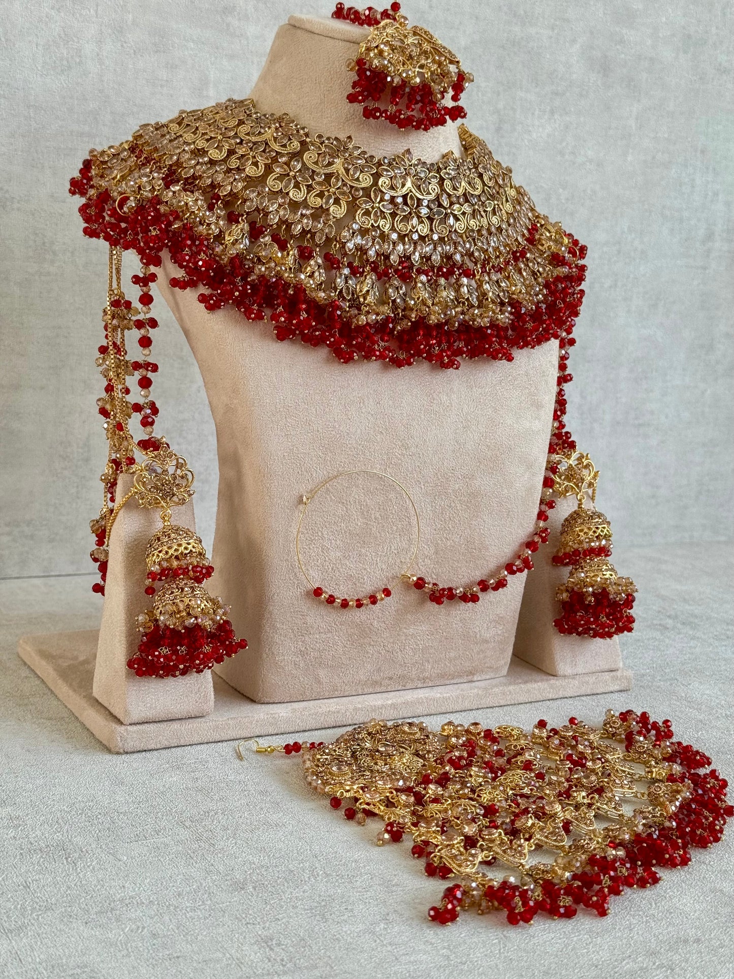 Ayura Designs Ishqiya Bridal Set with Necklace, Jhumkis with Sahare, Tikka & Jhoomer – Antique Gold, Champagne Stones & Red Bead Detailing