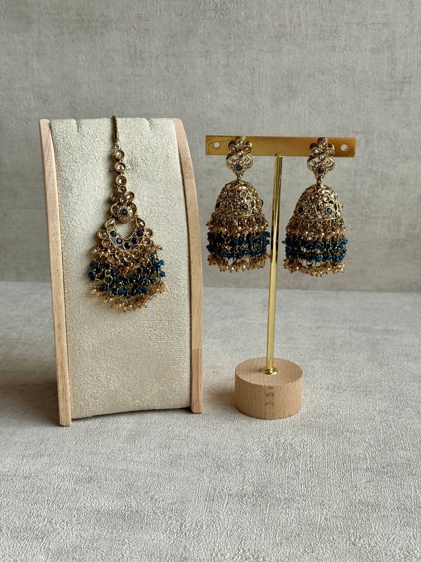 Ayura Designs Mahreen Set – Necklace, Jhumkis & Tikka with Mirror-Cut Stones, Peacock Blue Beads & Gold Finish