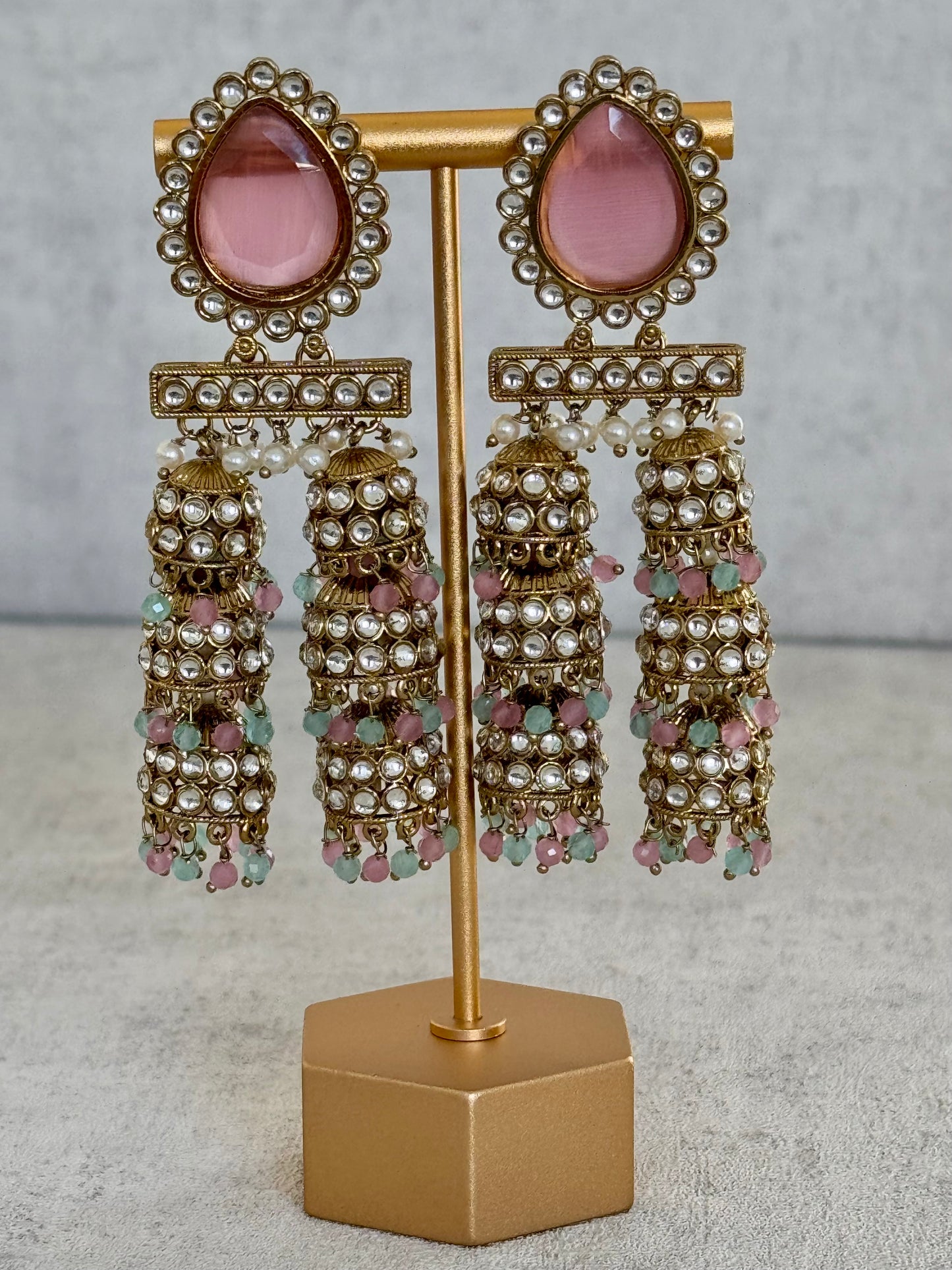 Ayura Designs Kyra Earrings – Pink & Gold Jhumkas with Kundan, Pearl, and Pastel Green & Pink Bead Detailing