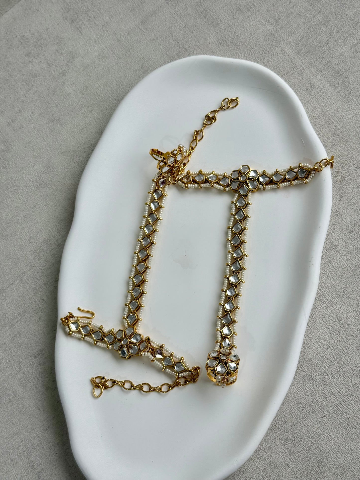 Ayura Designs Yara Haathphool – Mirror-Cut Stones with Pearl Bead Detailing in Antique Gold Finish