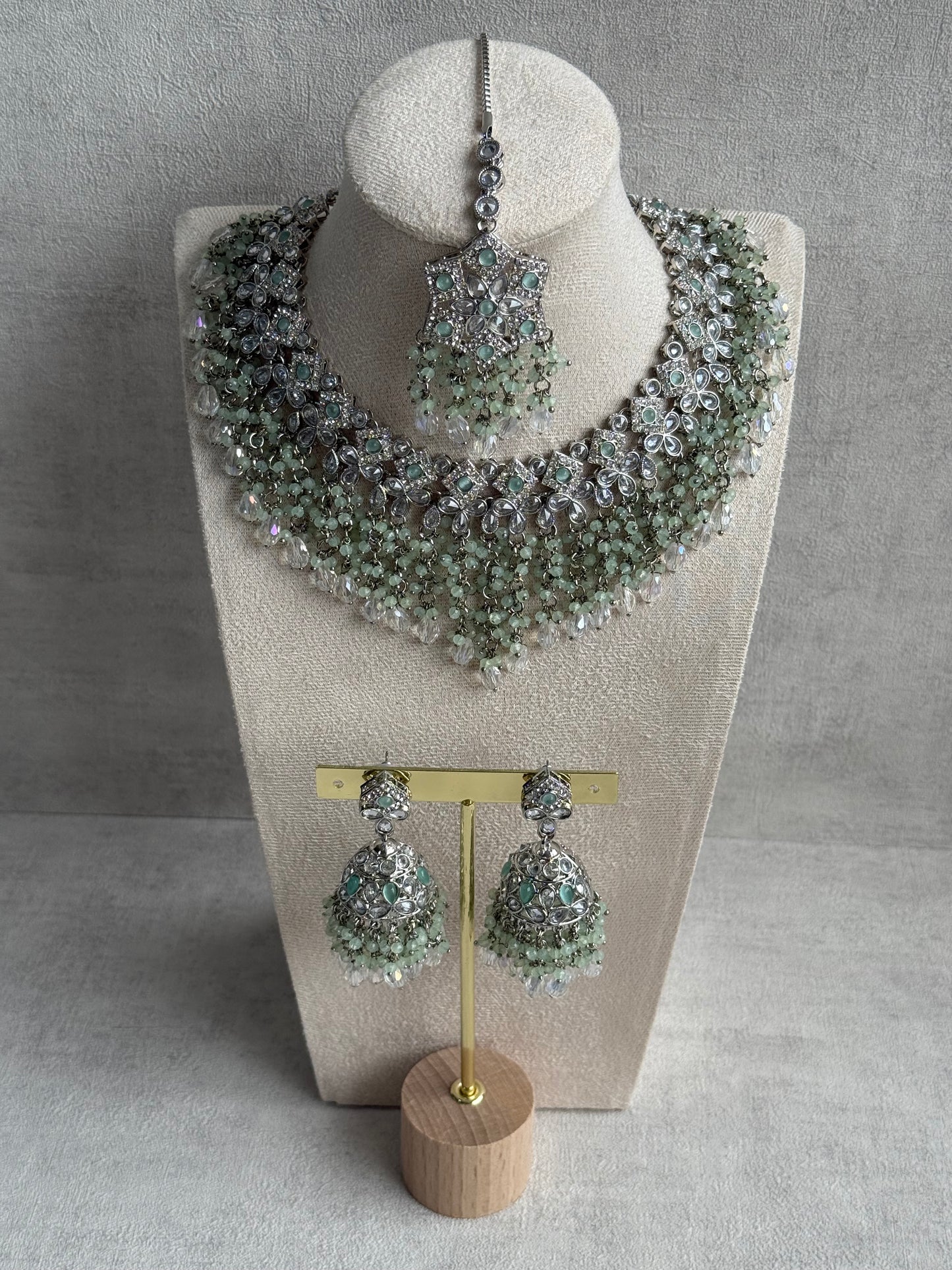 Ayura Designs Rayna Set – Necklace, Jhumkis & Tikka with Mint Green Beads, Mirror-Cut Stones & Silver Finish