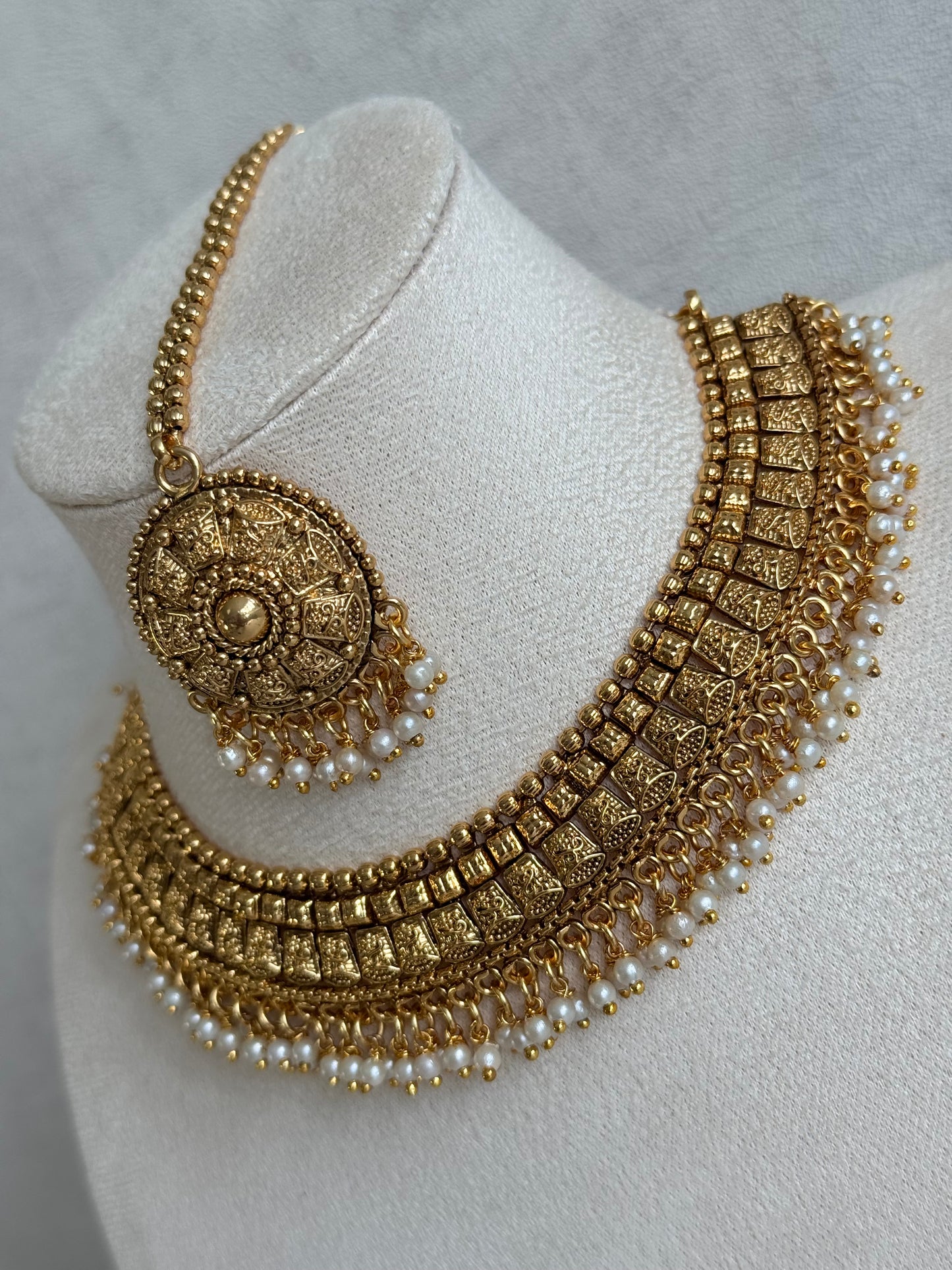 Ayura Designs Iksirat Necklace Set with Jhumkis & Tikka – Gold Heritage Design with Pearl Detailing