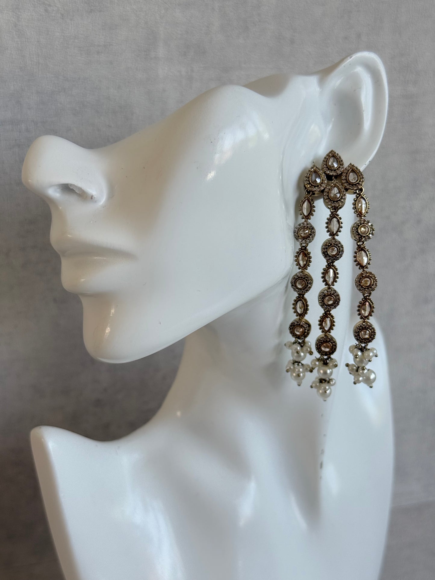 Ayura Designs Emilia Earrings – Gold Triple Strand Statement Earrings with Champagne Stones & Pearl Drops
