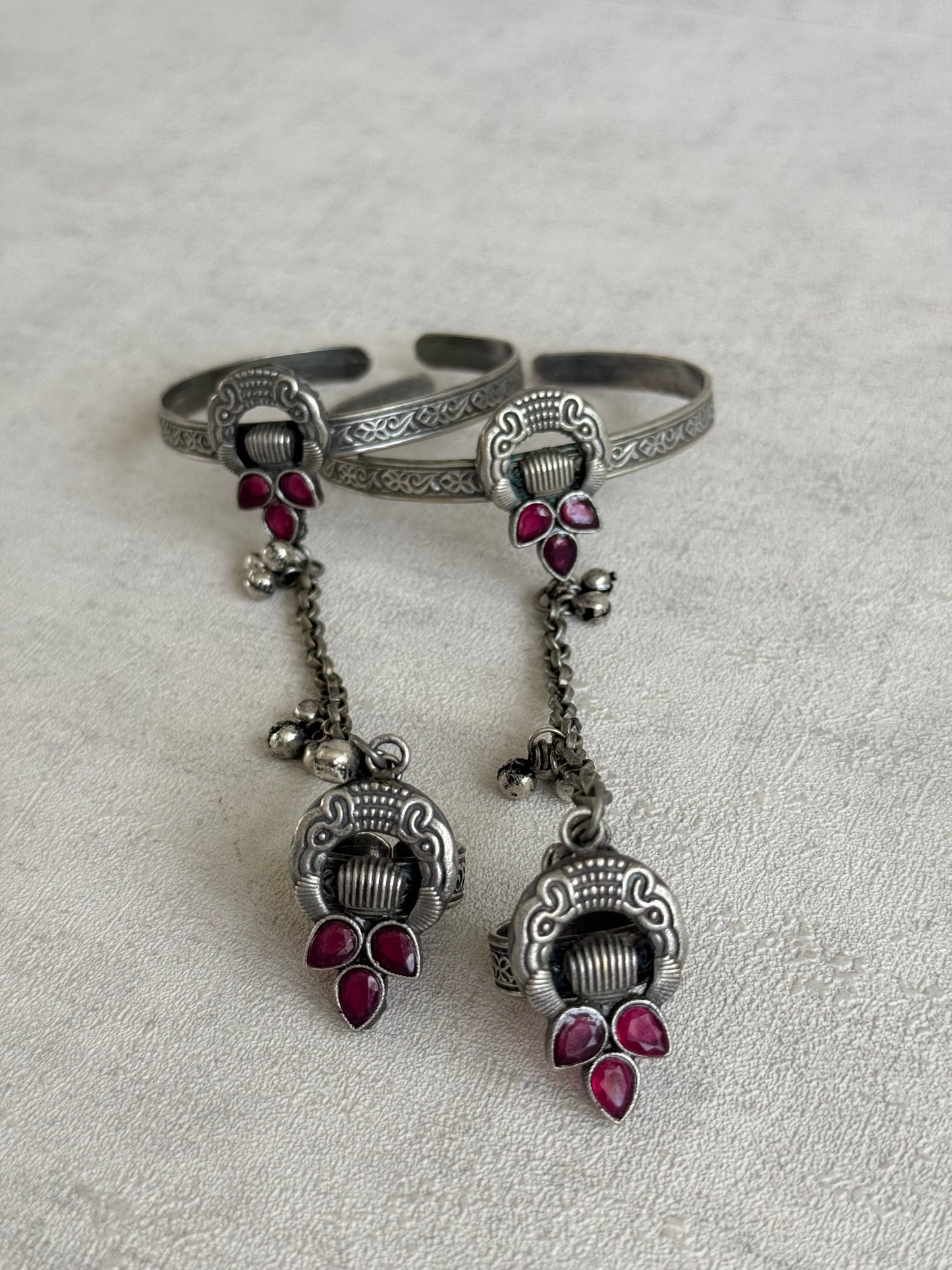 Ayura Designs Ishaana Haathphool Set of 2 – Oxidised Silver Hand Harness with Ruby Pink Stones & Ghungroo Detailing