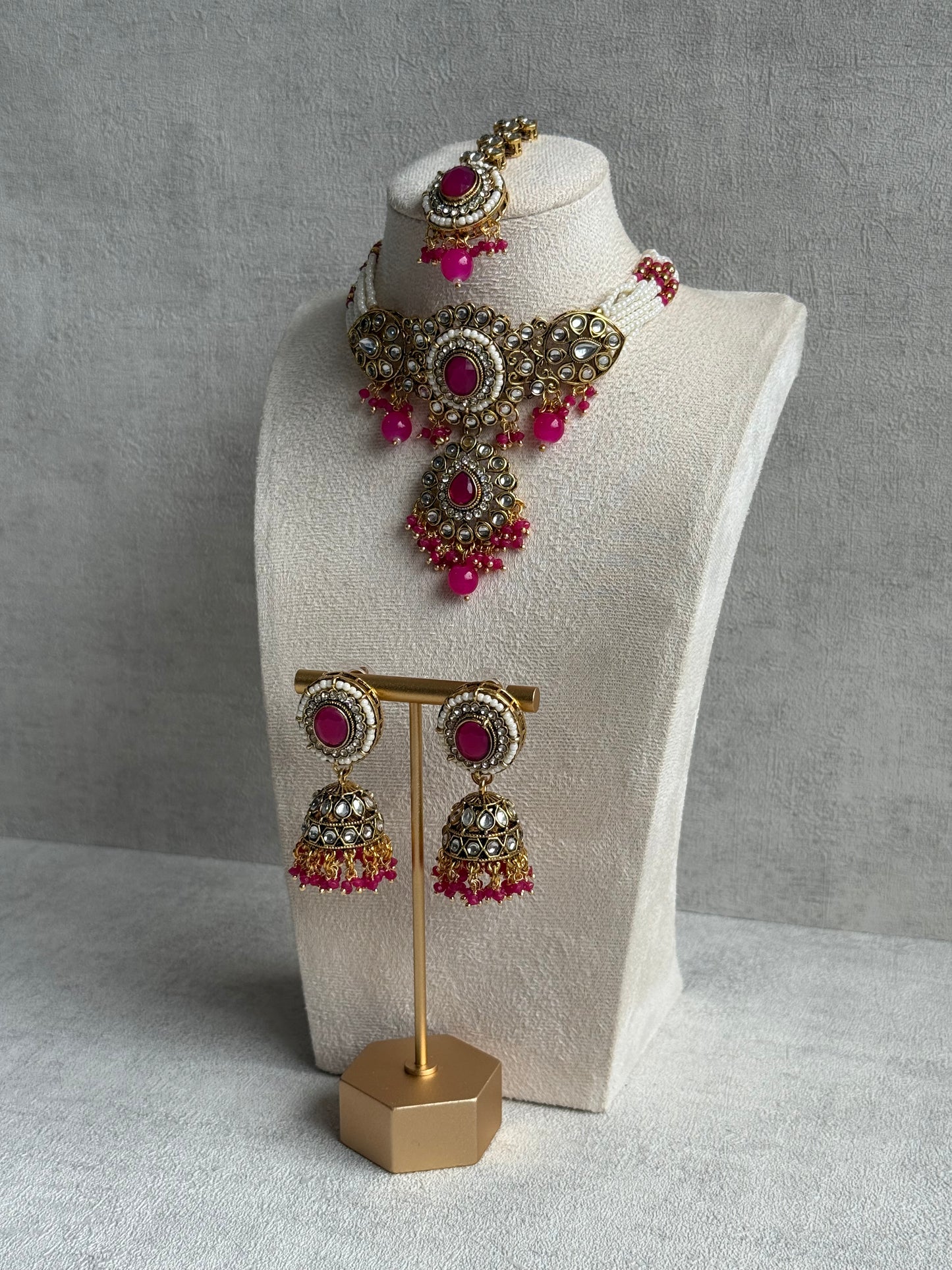 Ayura Designs Muskaan Set – Choker, Jhumkis & Tikka with Hot Pink Beads, Kundan Stones & Antique Gold Finish