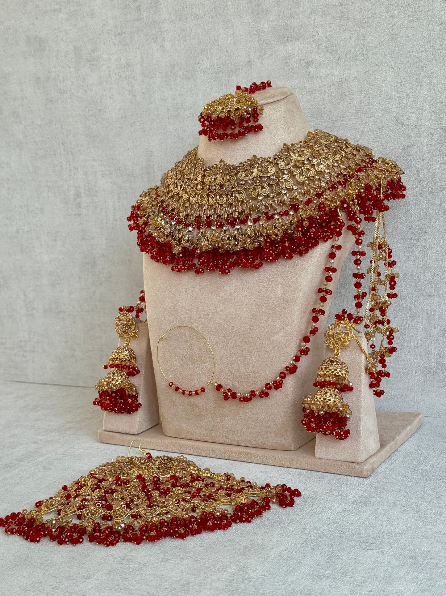 Ayura Designs Ishqiya Bridal Set with Necklace, Jhumkis with Sahare, Tikka & Jhoomer – Antique Gold, Champagne Stones & Red Bead Detailing