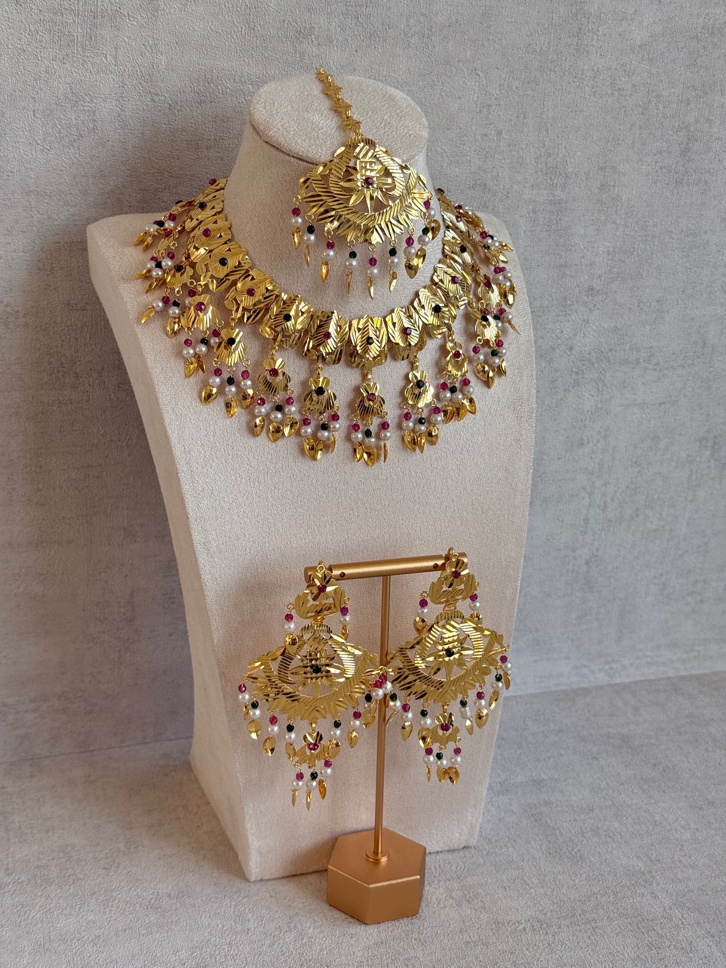 Ayura Designs Baisakhi Set with Earrings & Tikka – Gold Pipal Patti Design with Ruby Pink, Emerald Green & Pearl Detailing