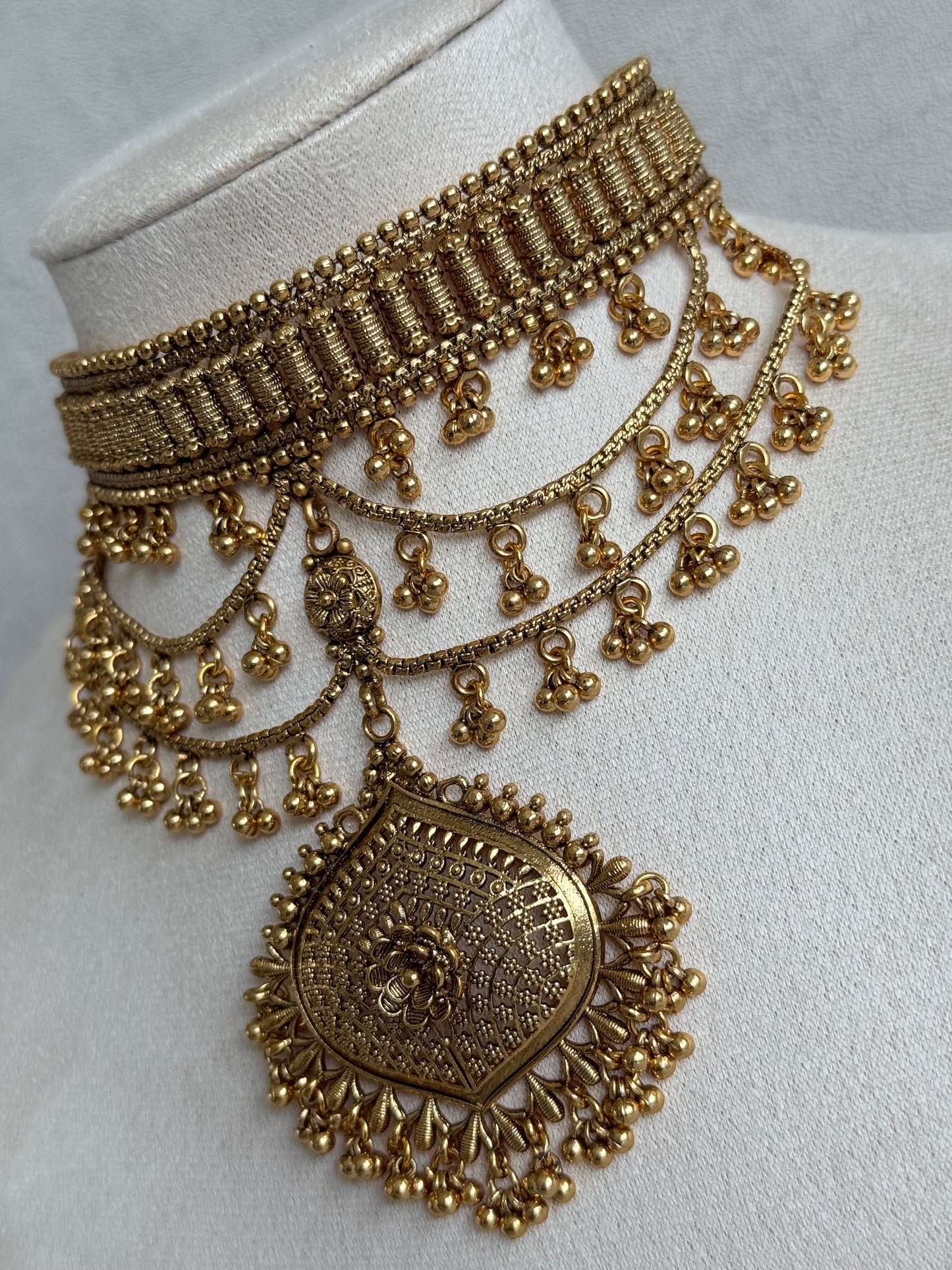 Ayura Designs Sahira Choker Set with Earrings & Tikka – Gold Engraved Choker with Floral Pendant & Ghungroo Detailing