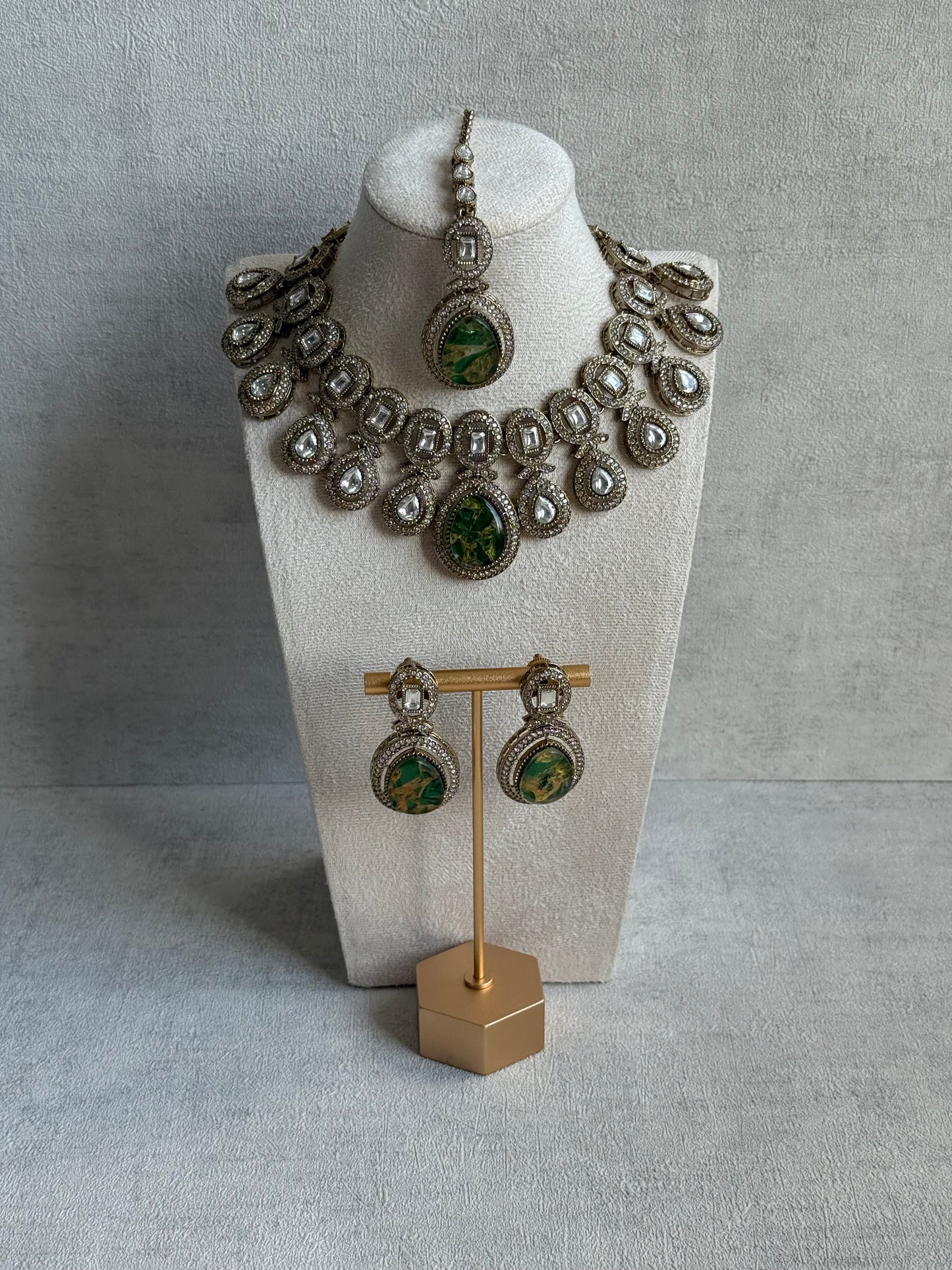 Ayura Designs Aurora Set with Earrings & Tikka – Emerald Green Stone & Mirror-Cut Accents in Antique Gold Finish