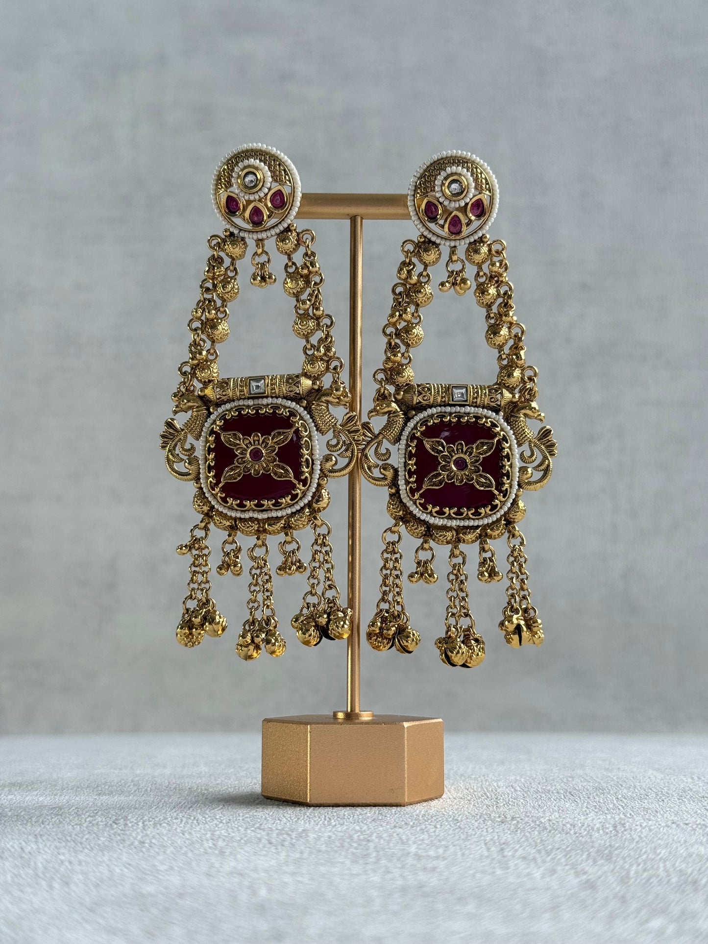 Ayura Designs Hazar Earrings – Gold Peacock Design with Ruby Red Enamel, Pearl Beading & Ghungroo Detailing