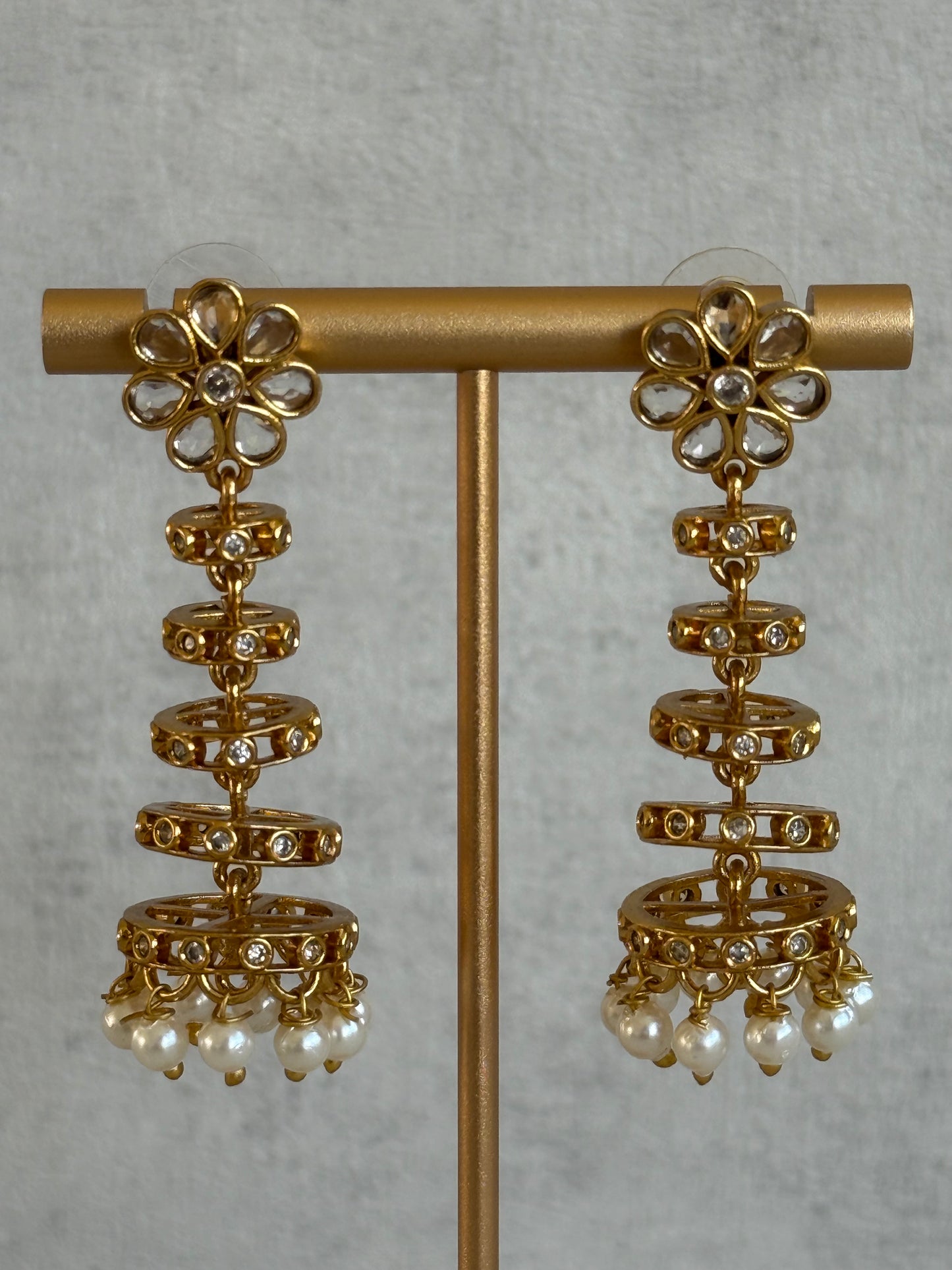 Ayura Designs Adira Jhumkis – Gold Floral Jhumkis with Layered Crystal Rings & Pearl Drops
