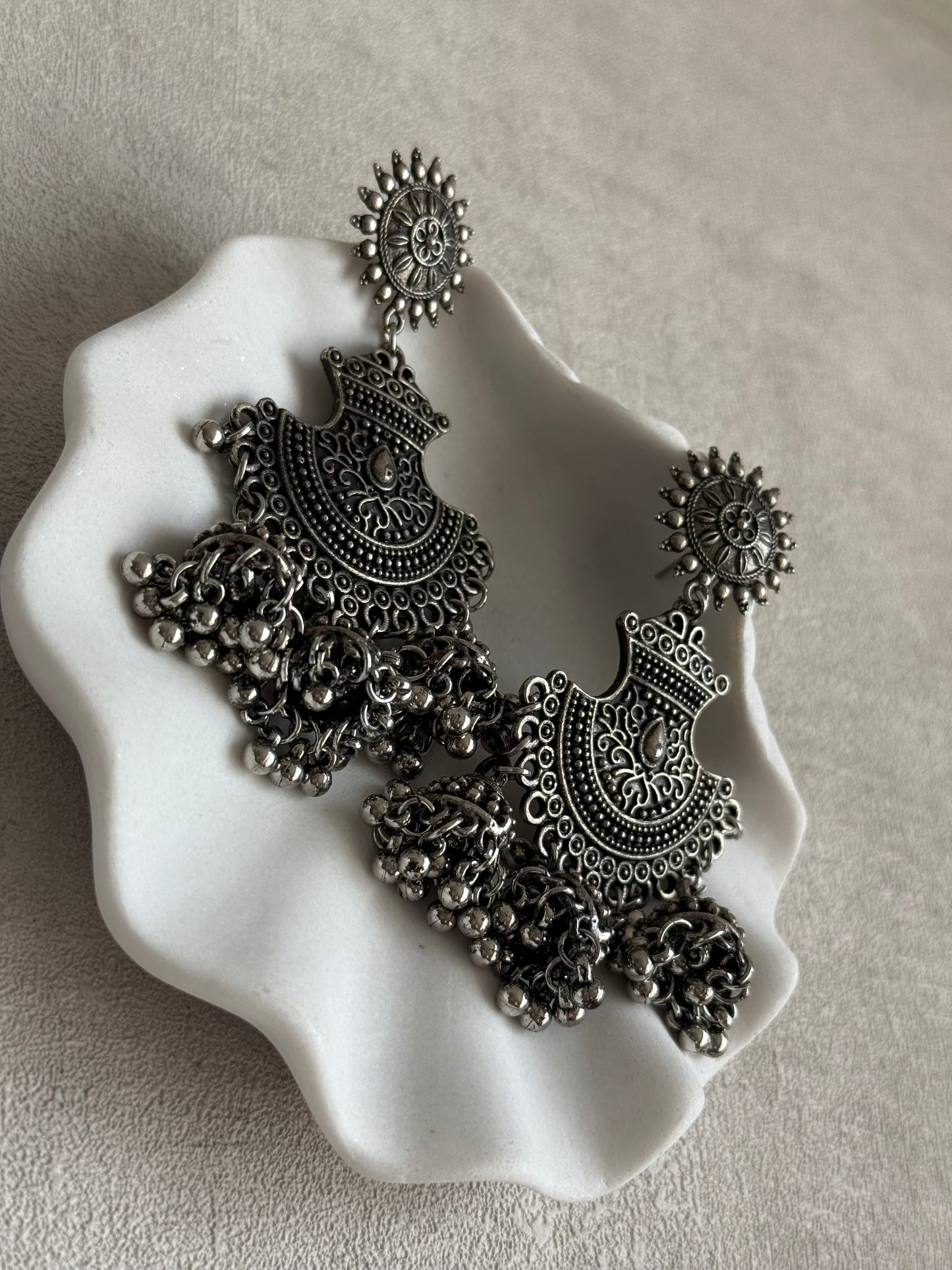 Ayura Designs Mahfar Earrings – Oxidised Silver Jhumkas with Sunburst Tops & Triple Dome Drops
