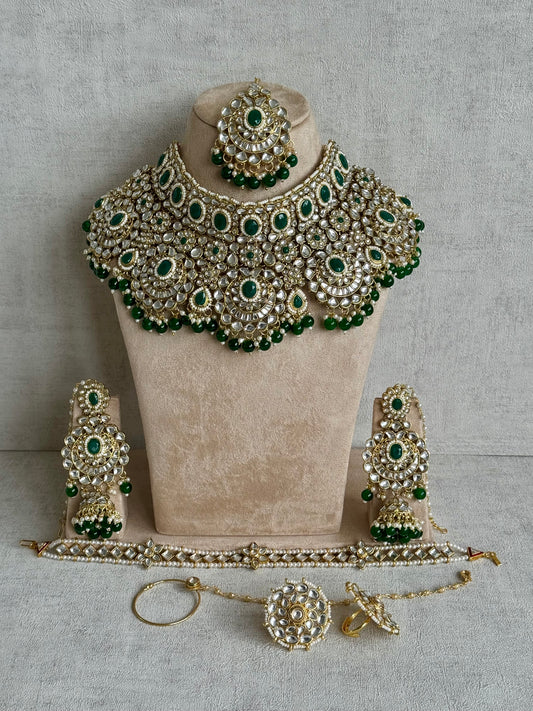 Ayura Designs Meherbano Bridal Set with Necklace, Jhumkis, Tikka, Nath, Ring & Sheeshphool – Jadau Kundan Craftsmanship with Mirror-Cut Polki, Emerald Green Stones & Antique Gold Finish
