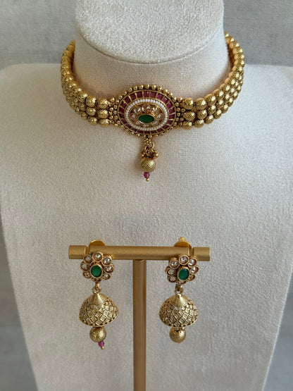 Ayura Designs Kavish Choker Set – Antique Gold Choker with Jhumkis in Rani Pink & Emerald Green with Pearl Detailing