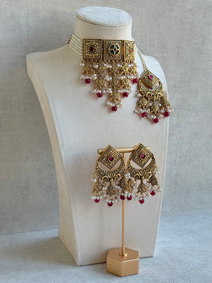 Ayura Designs Samera Choker Set with Earrings & Tikka – Rani Pink Beads, Pearl Detailing, Green Centre Stone, Floral Motifs & Antique Gold Finish