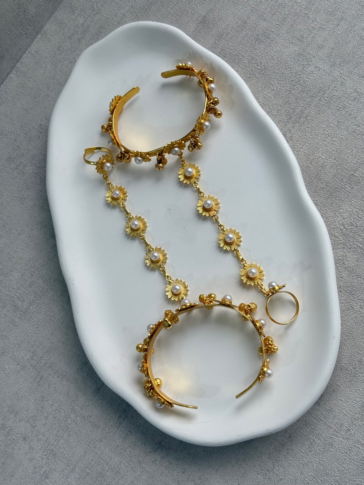Ayura Designs Avanti Haathphool Set of 2 – Gold Finish Floral Hand Harness with Ivory Pearls & Ghungroo Detailing