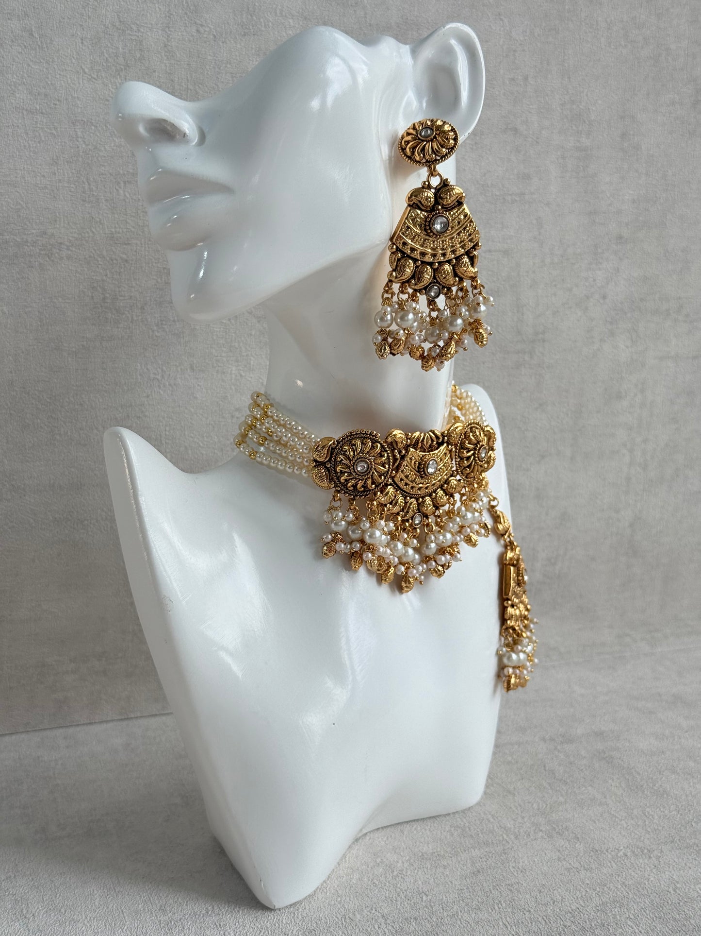Ayura Designs Sairish Choker Set with Earrings & Tikka – Ivory Beads, Pearl Detailing, Ghungroos, Paisley Motifs & Antique Gold Finish