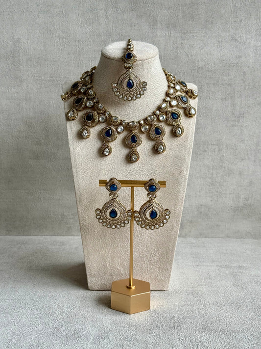 Ayura Designs Sahira Set – Necklace, Earrings & Tikka with Sapphire Blue Stones, Mirror-Cut Detailing & Antique Gold Finish