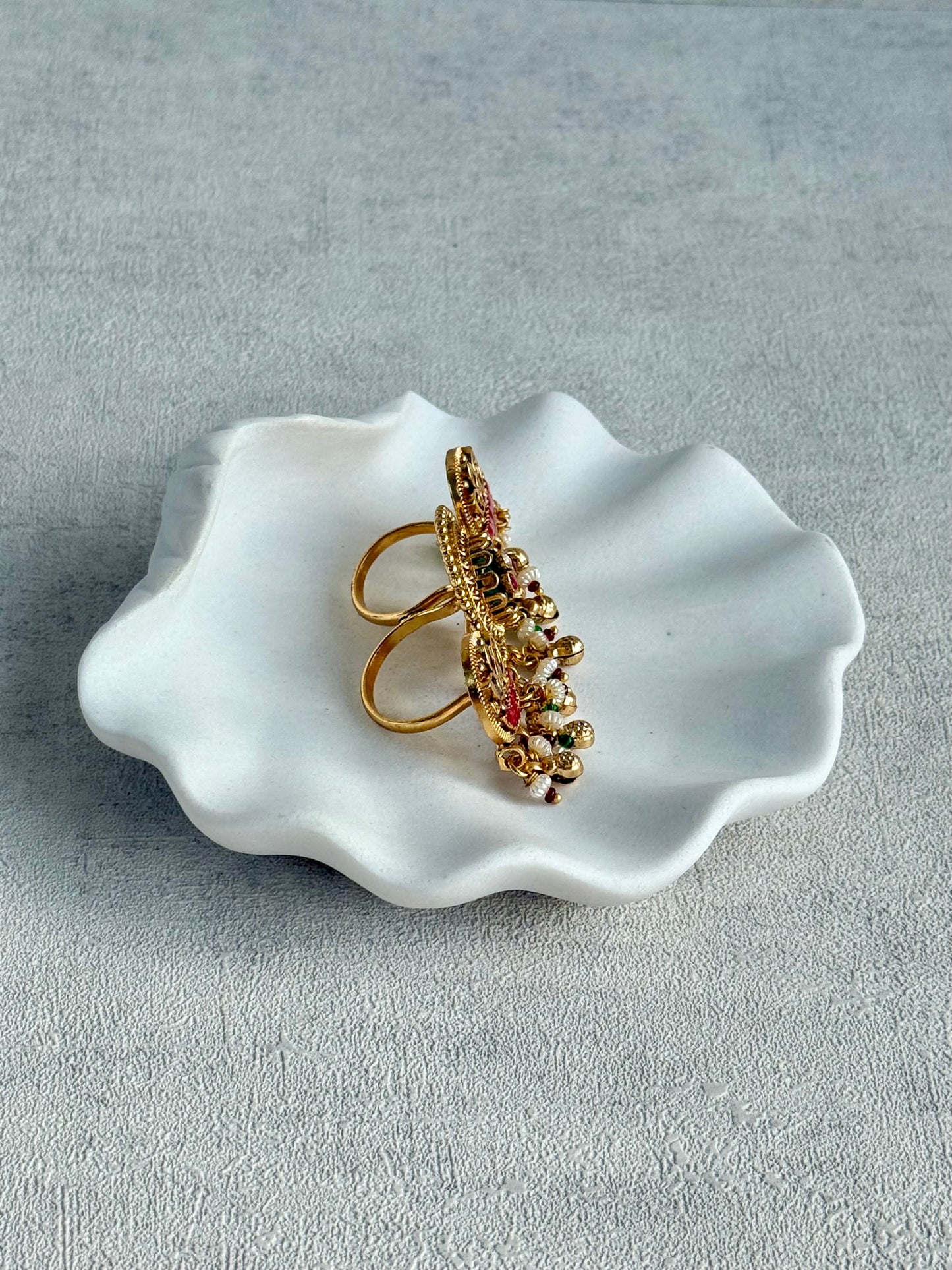 Ayura Designs Raha Adjustable Ring – Antique Gold Lotus Motifs with Emerald Green & Rani Pink Stones, Pearl Drops & Ghungroo Detailing