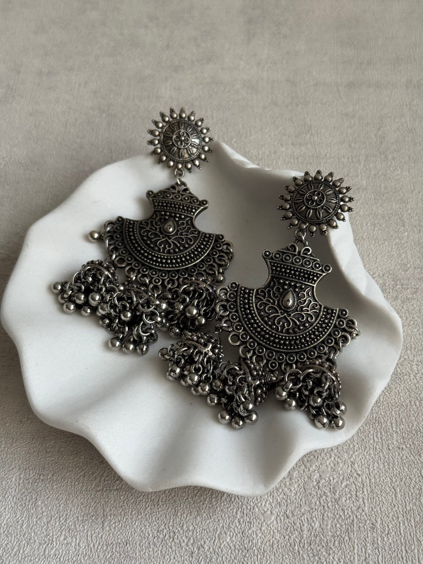 Ayura Designs Mahfar Earrings – Oxidised Silver Jhumkas with Sunburst Tops & Triple Dome Drops