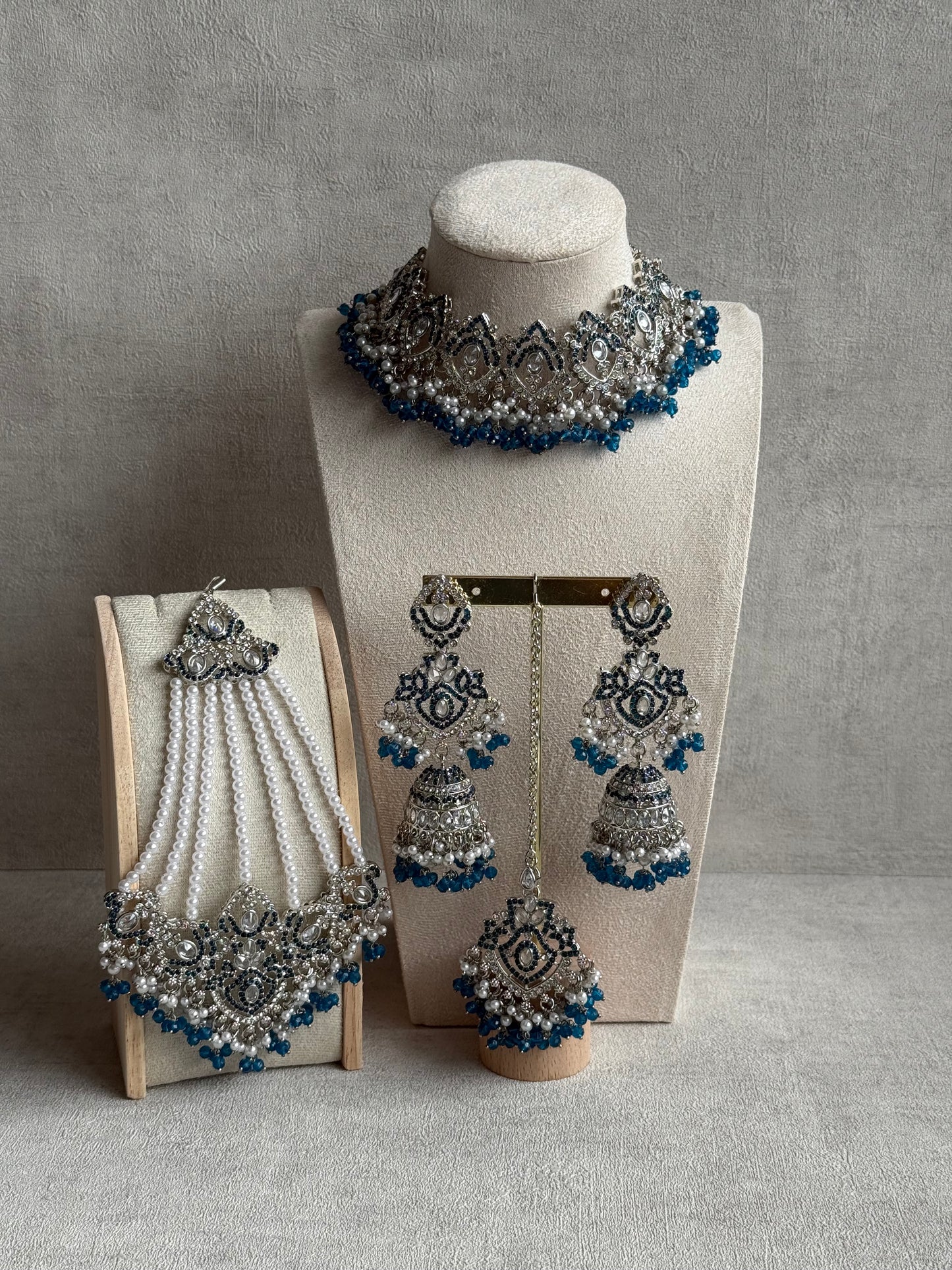 Ayura Designs Wania Set with Jhumkis, Tikka & Passa – Peacock Blue Beads, Mirror-Cut Stones & Antique Silver Finish