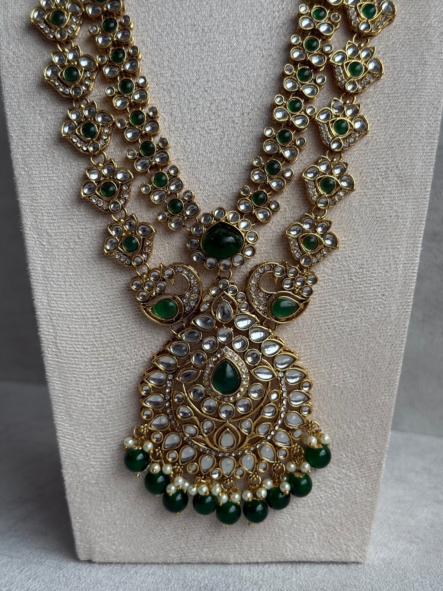 Ayura Designs Javeria Set with Earrings & Tikka – Emerald Green Stones, Mirror Kundan & Gold Finish