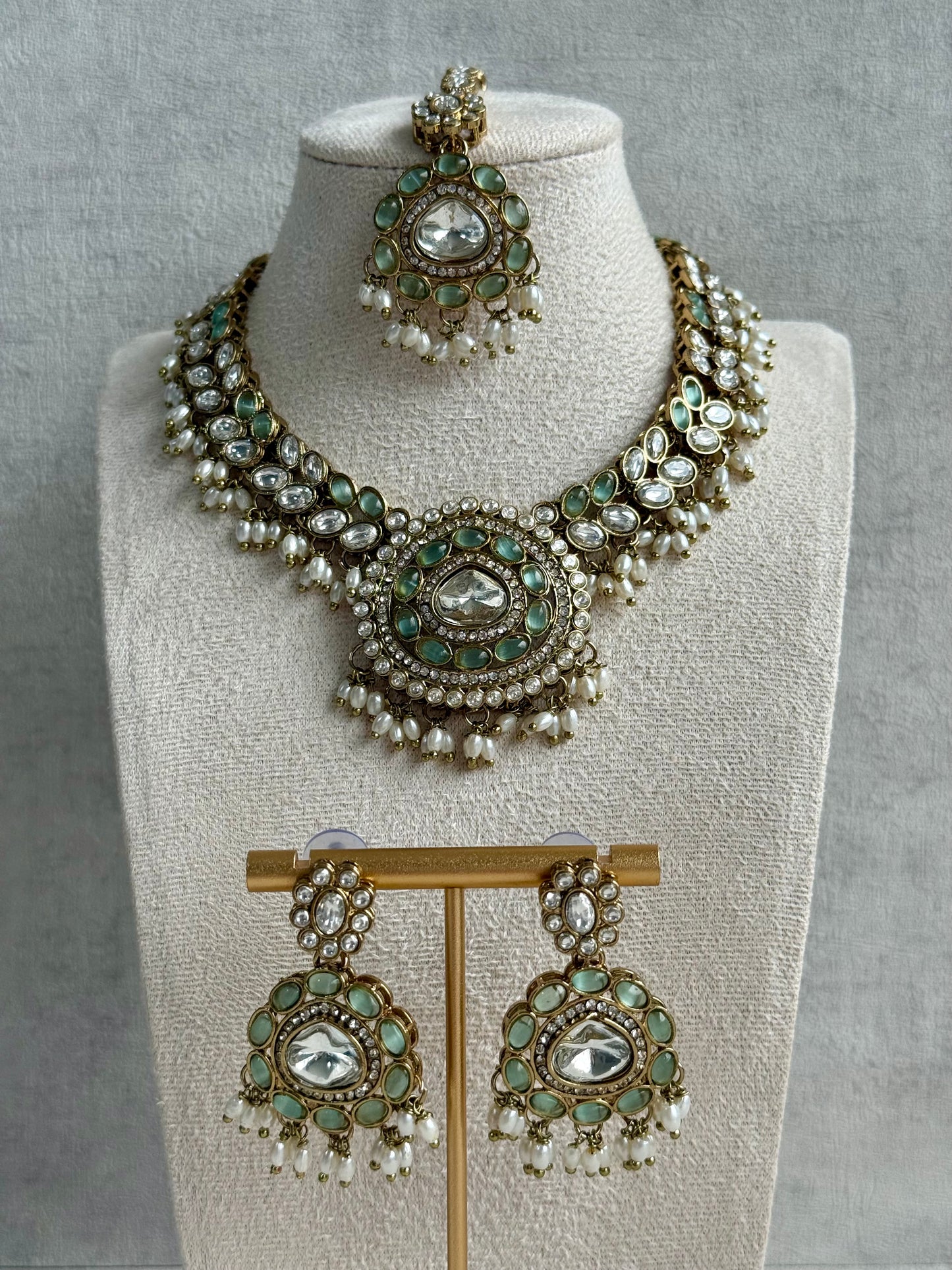 Ayura Designs Warda Set with Earrings & Tikka – Pistachio Green Ovals, Mirror-Cut Stones & Ivory Pearls