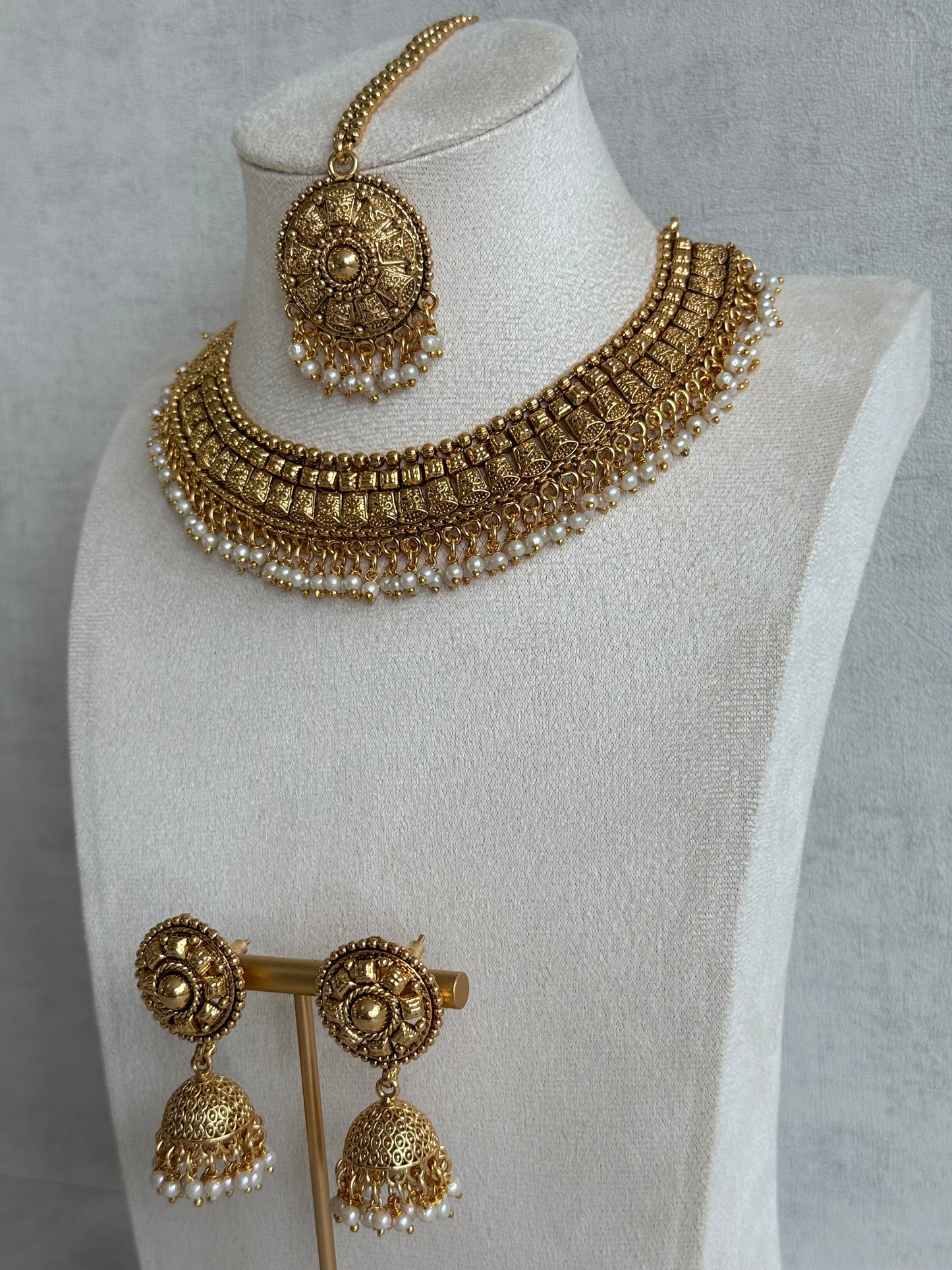 Ayura Designs Iksirat Necklace Set with Jhumkis & Tikka – Gold Heritage Design with Pearl Detailing