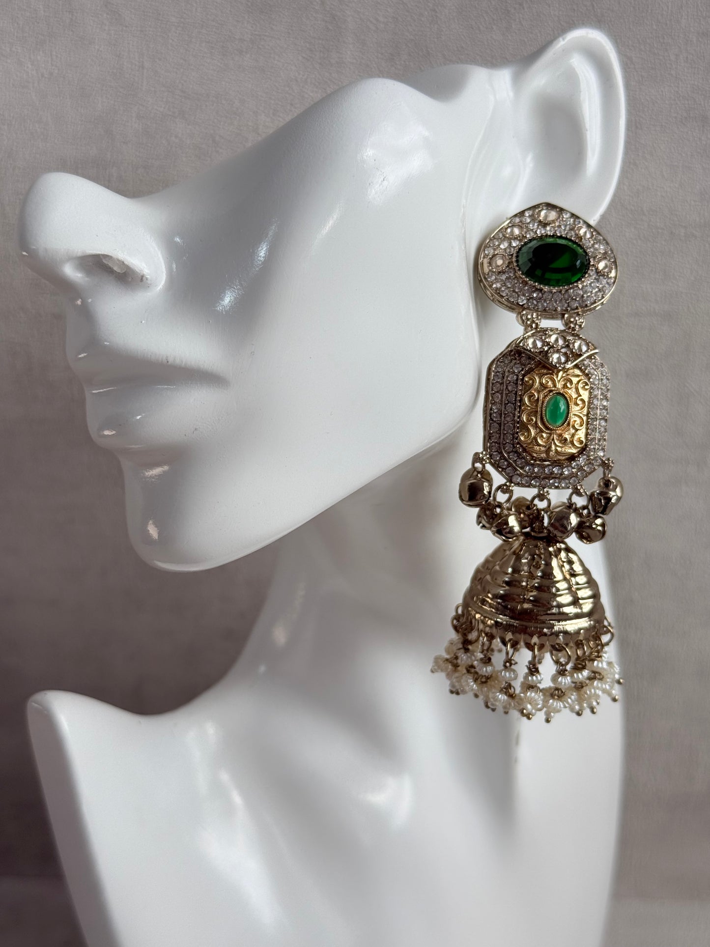 Ayura Designs Maara Jhumkis – Champagne Gold with Emerald Green Stones, Crystals, Ghungroos & Pearl Detailing