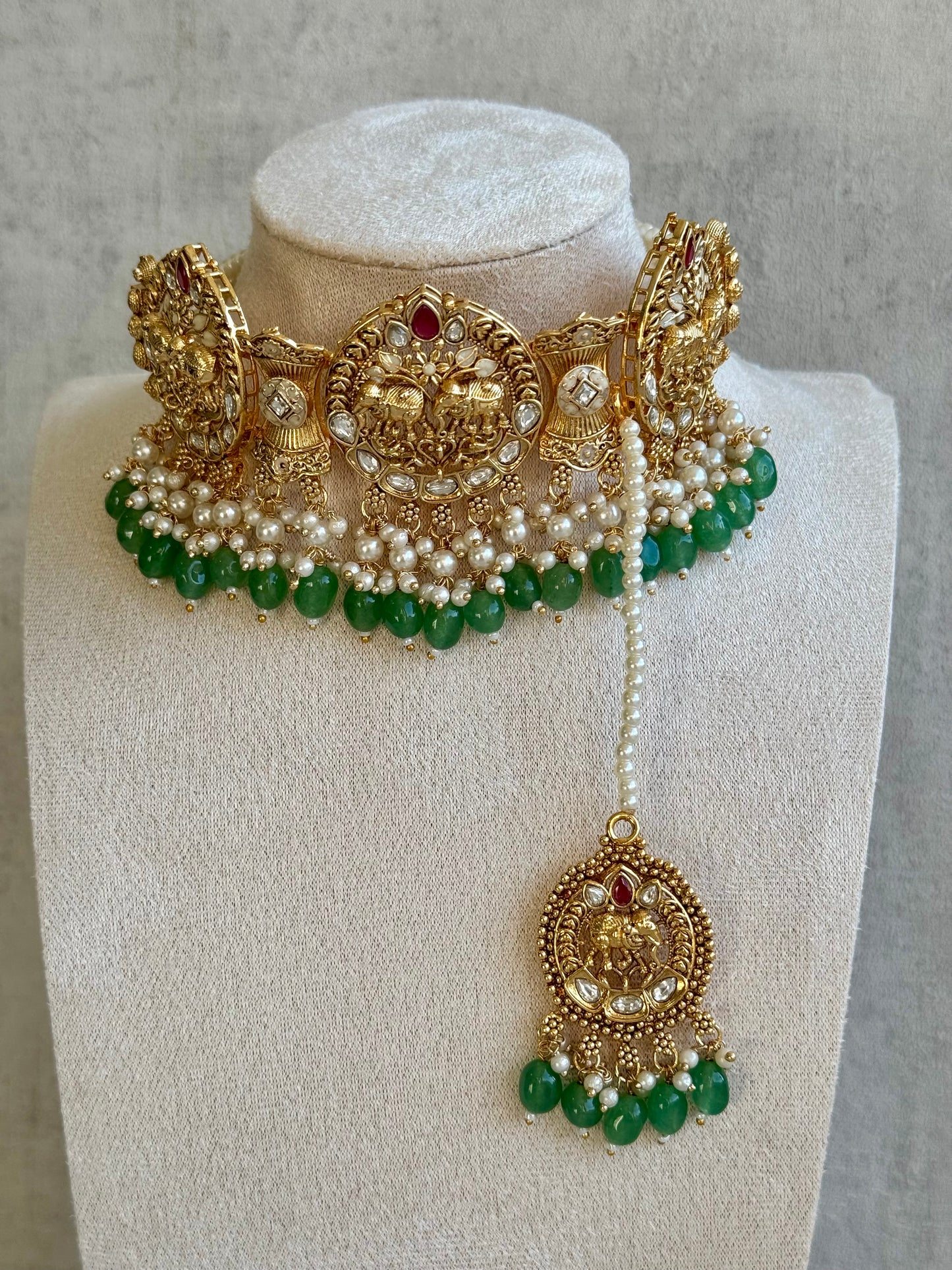 Ayura Designs Tanu Choker Set with Earrings & Tikka – A Golden Harmony of Pearls, Emerald Hues & Crimson Accents