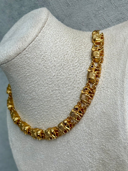 Ayura Designs Veda Set – Antique Gold Necklace & Stud Earrings with Elephant Motifs and Pink Stone Detailing