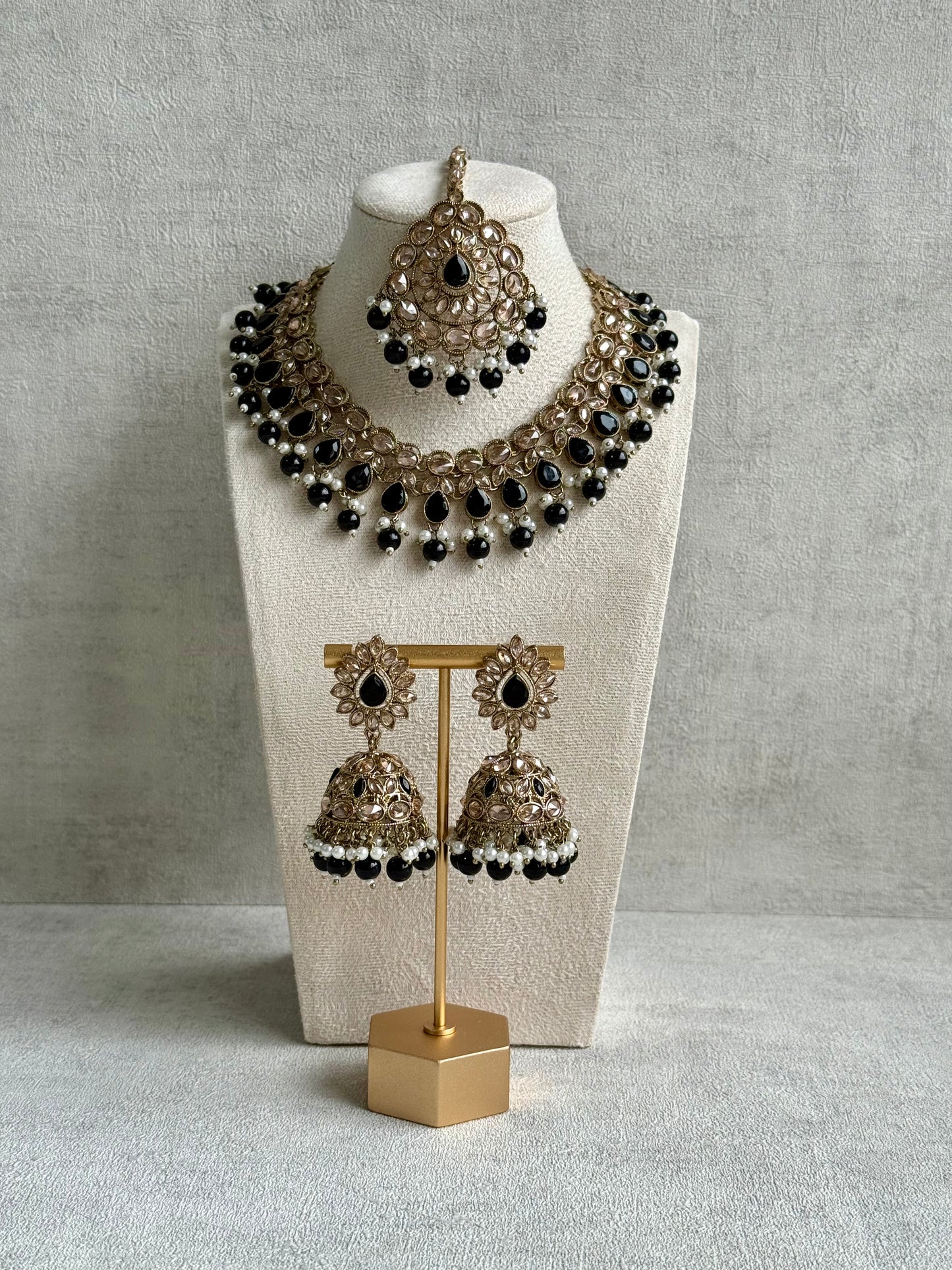 Ayura Designs Emaan Set with Jhumkis & Tikka – Black Beads, Mirror-Cut Stones & Antique Gold Finish