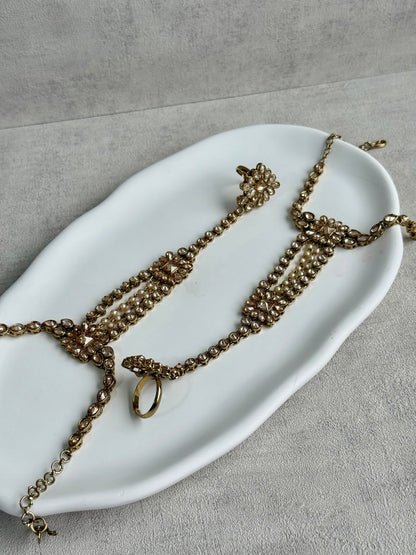 Ayura Designs Rupi Haathphool – Antique Gold with Champagne Stones & Pearl Detailing