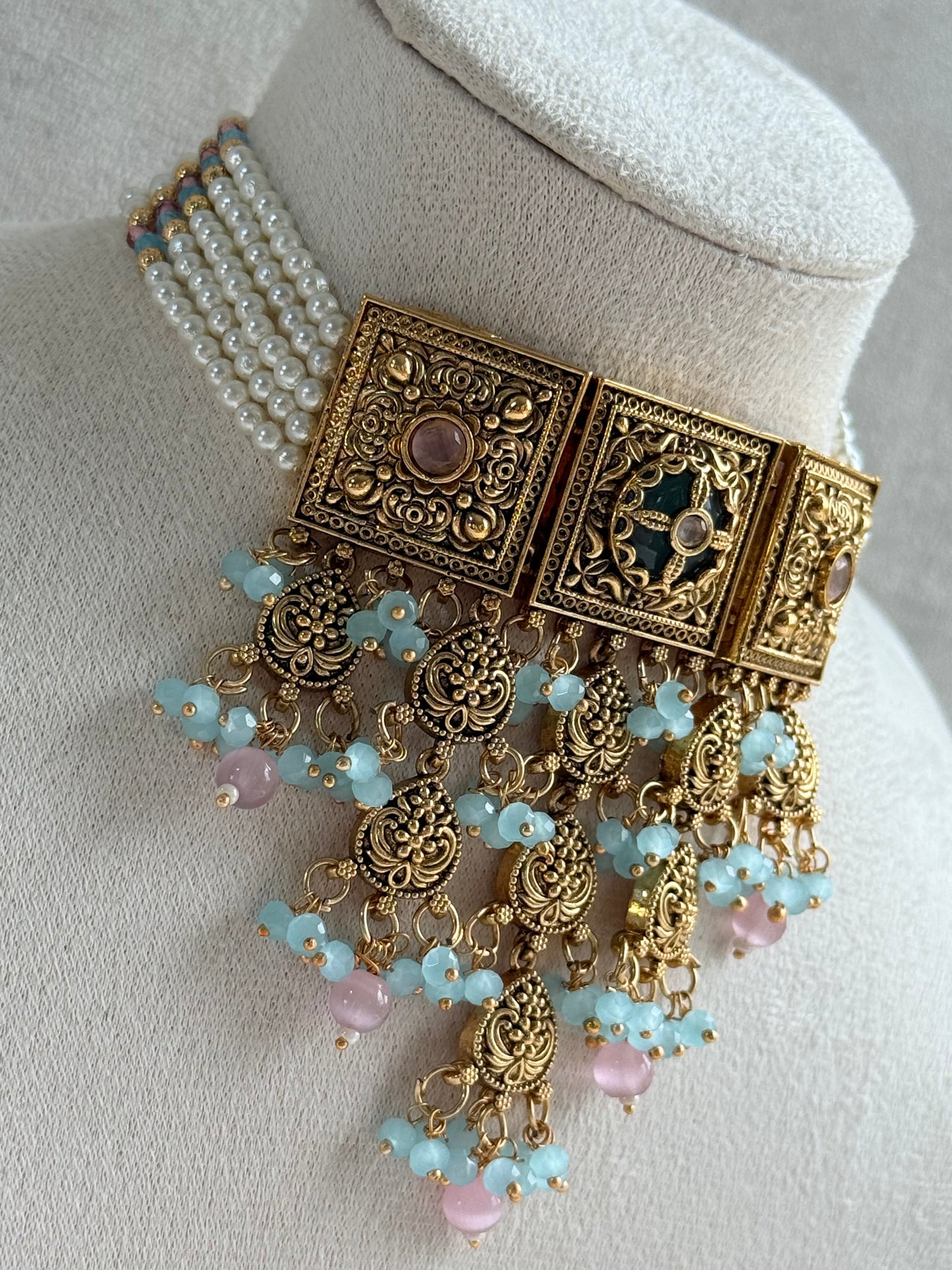 Ayura Designs Samera Choker Set with Earrings & Tikka – Aqua Blue & Blush Pink Beads, Green Centre Stone, Floral Motifs & Antique Gold Finish
