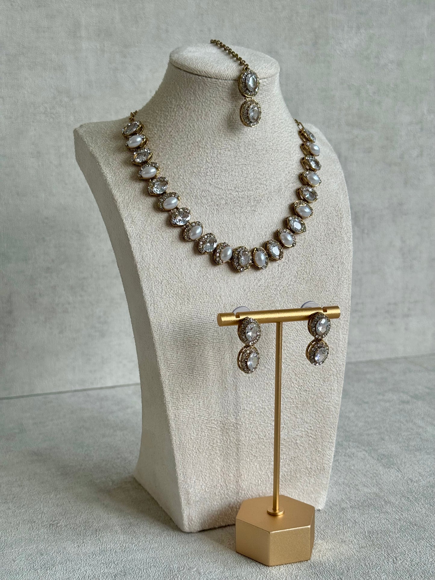 Ayura Designs Eira Set – Necklace, Earrings & Tikka with Diamond-Cut & Ivory Oval Stones in Antique Gold