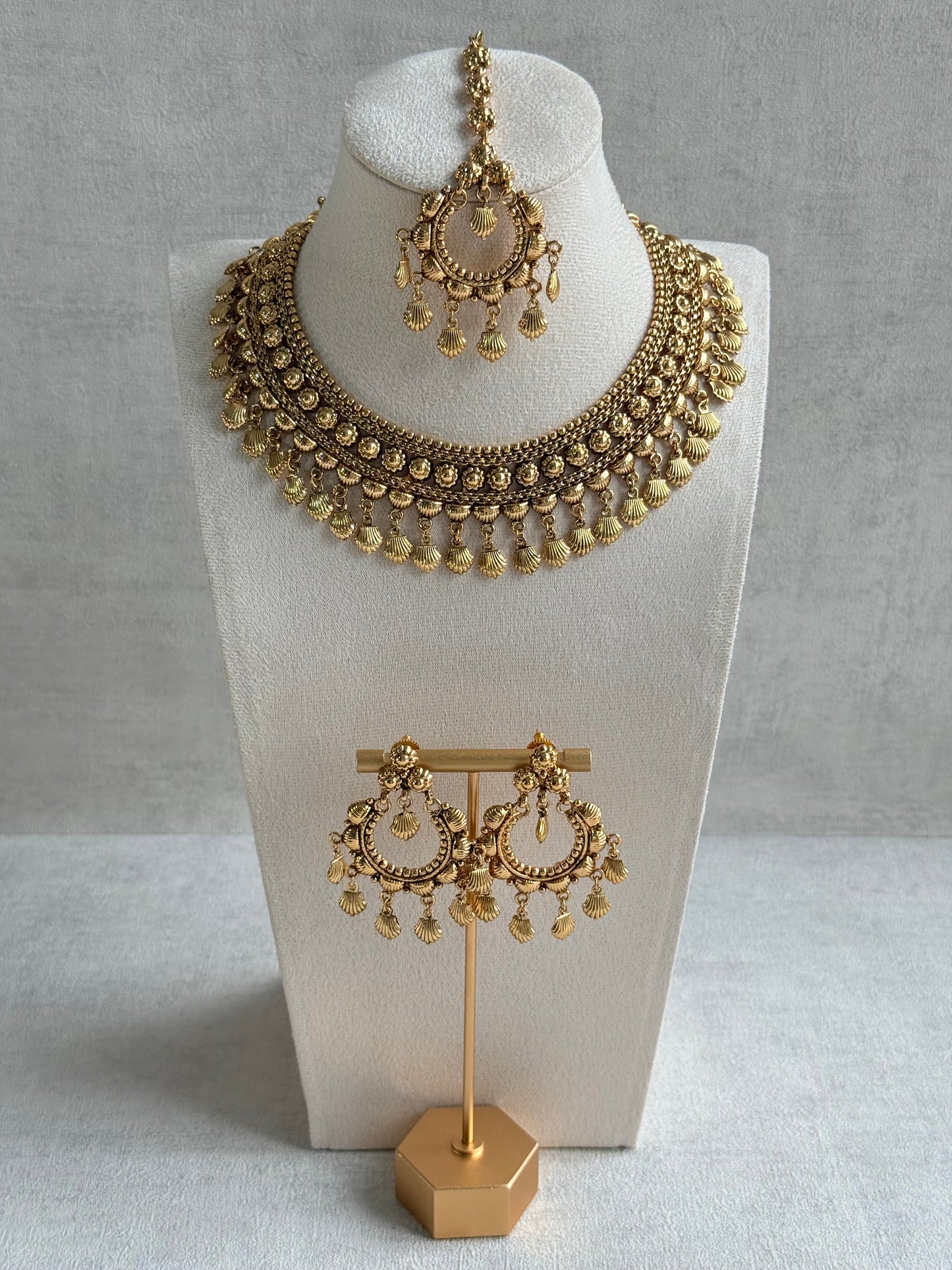 Ayura Designs Falaq Necklace Set with Earrings & Tikka – Gold Finish with Layered Chain, Floral & Shell Drop Detailing