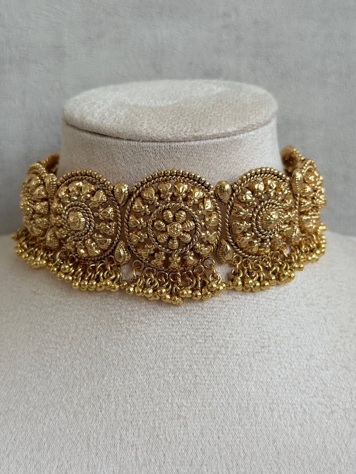 Ayura Designs Nawabi Choker Set with Jhumkis & Tikka – Traditional Gold Tone Bridal Choker with Floral Motifs & Ghungroo Detailing