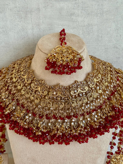 Ayura Designs Ishqiya Bridal Set with Necklace, Jhumkis with Sahare, Tikka & Jhoomer – Antique Gold, Champagne Stones & Red Bead Detailing