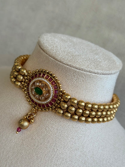 Ayura Designs Kavish Choker Set – Antique Gold Choker with Jhumkis in Rani Pink & Emerald Green with Pearl Detailing