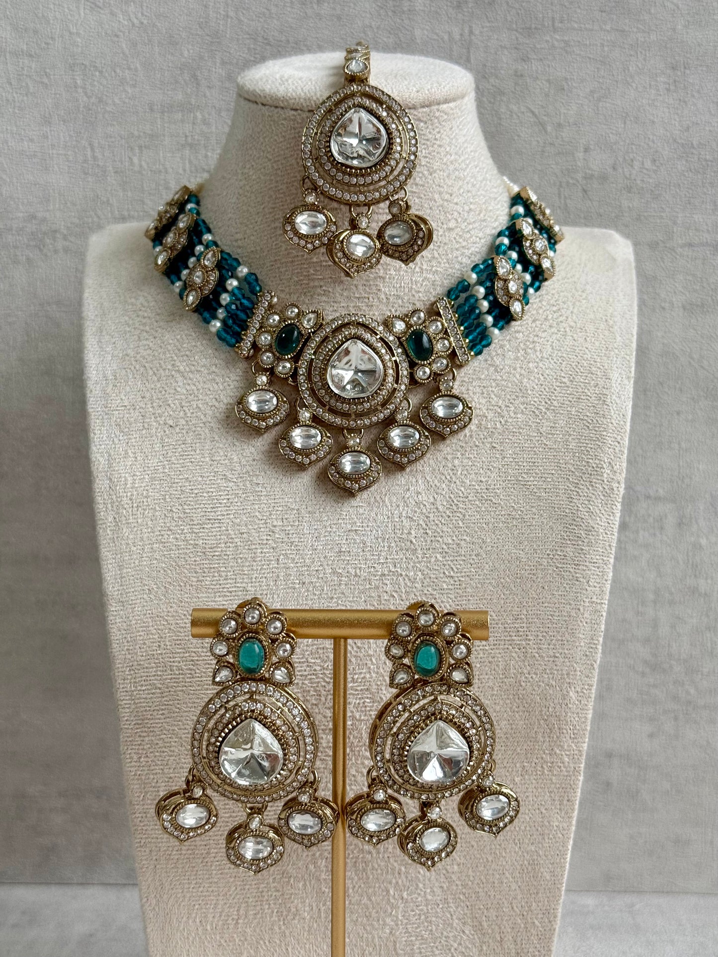 Ayura Designs Rahi Necklace Set with Earrings & Tikka – Teal Blue Stones with Mirror-Cut Detailing & Pearl Strands