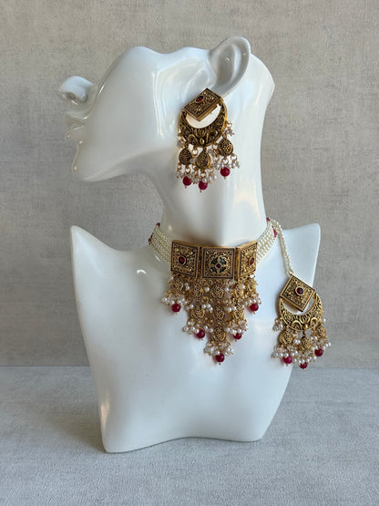 Ayura Designs Samera Choker Set with Earrings & Tikka – Rani Pink Beads, Pearl Detailing, Green Centre Stone, Floral Motifs & Antique Gold Finish