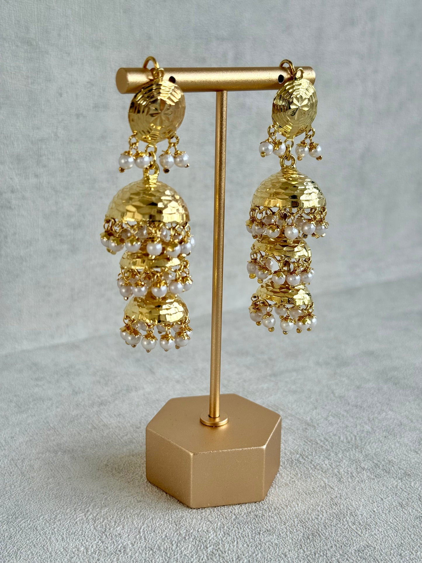 Ayura Designs Noorak Jhumkis – Hammered Gold Layered Jhumkis with Pearl Drop Detailing